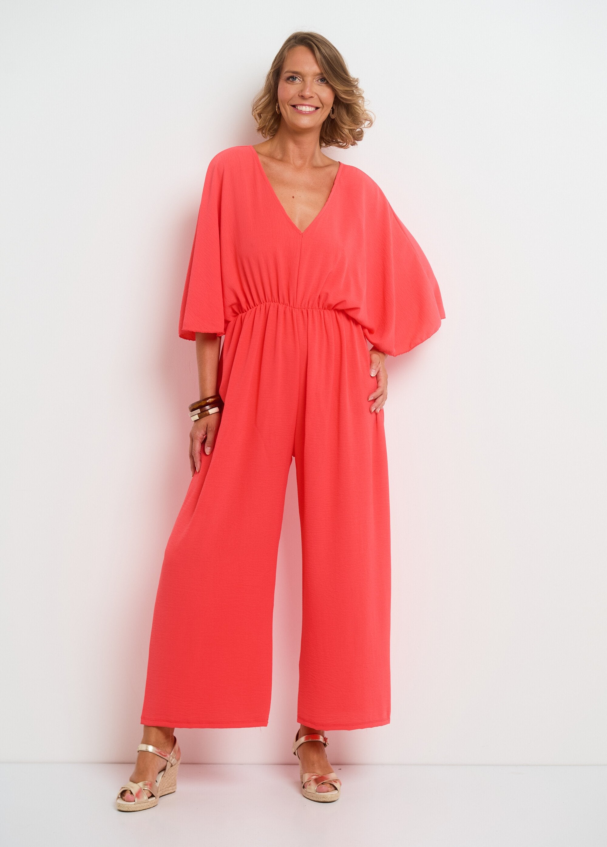 Fluid_V-neck_jumpsuit_with_tie_back_Coral_FA1_slim